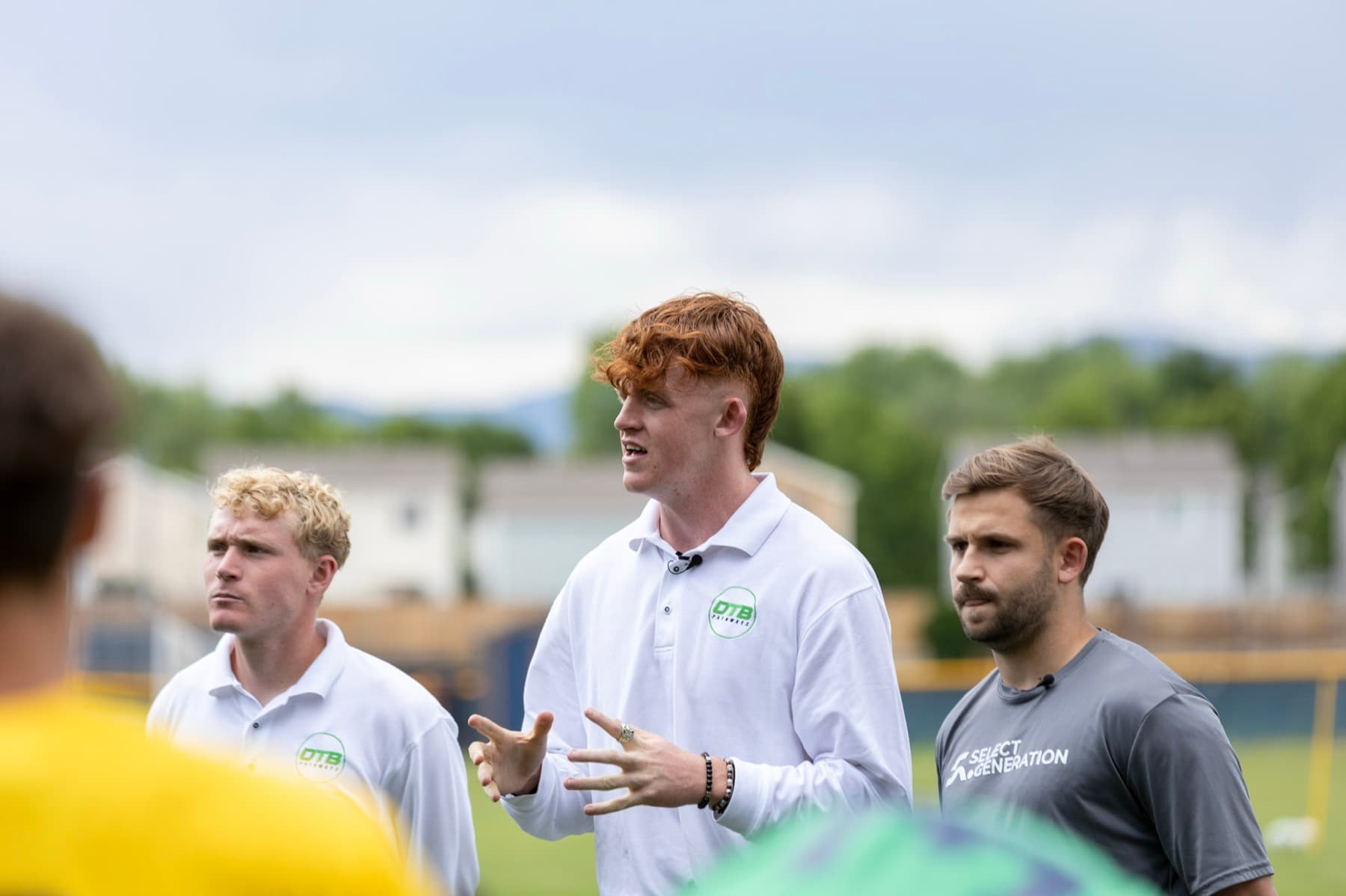 Cullen Freeman (left) and Aidan Cann (center) addressing players at the OTB Denver showcase